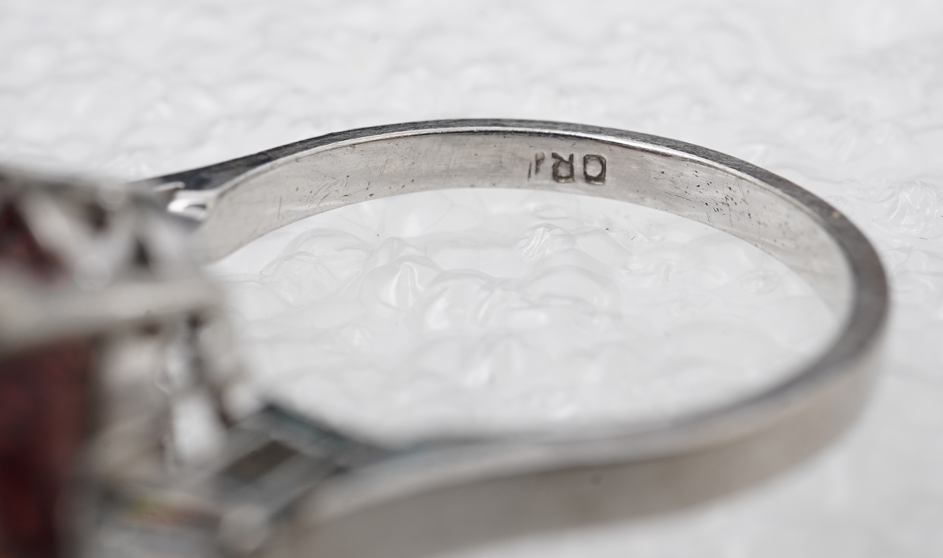 A garnet and diamond ring